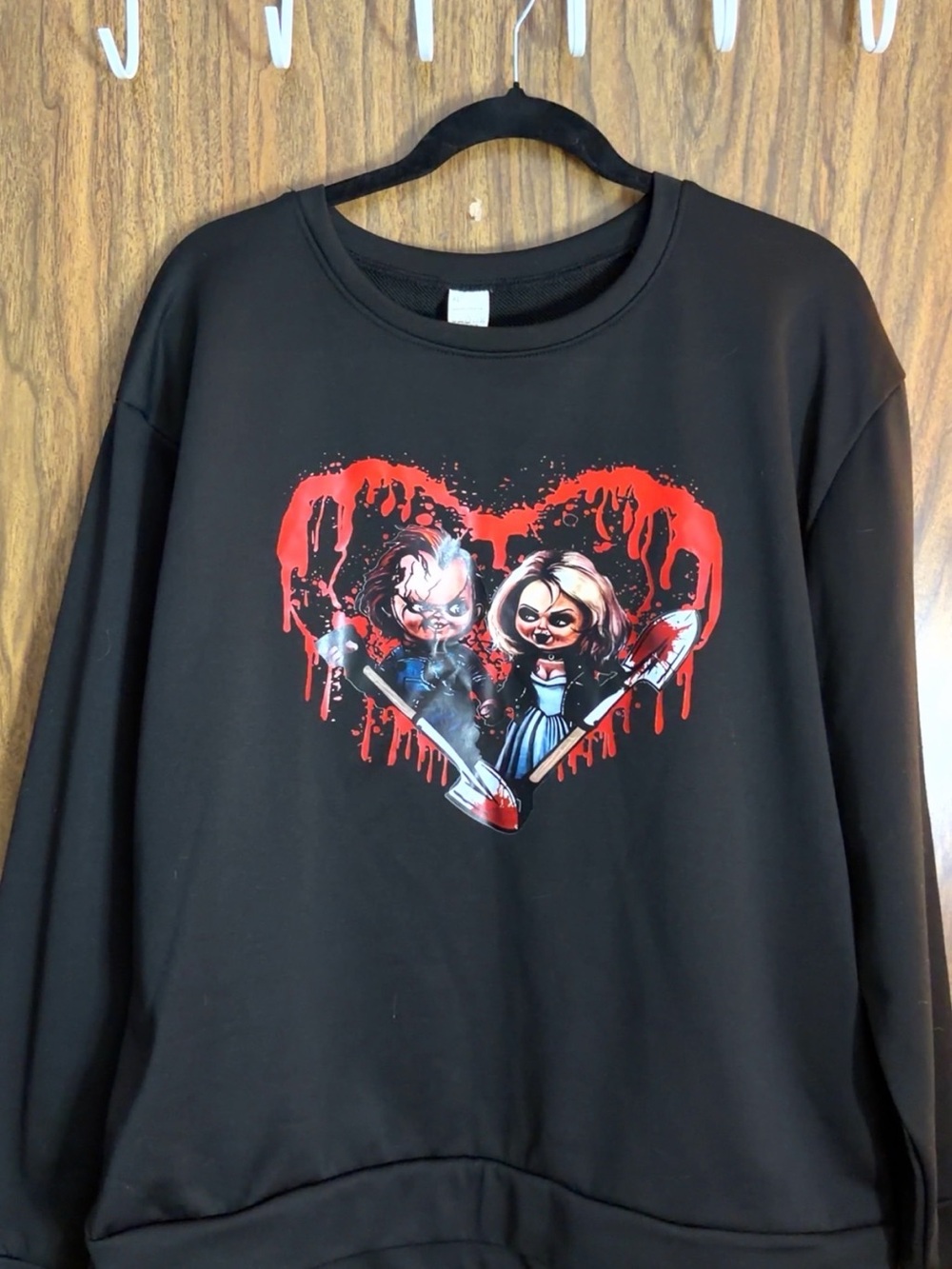 Black Graphic Pullover Sweatshirt with Red Heart Horror Print